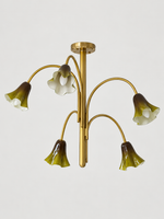 Green 5-light flower glass chandelier with copper-tone arched arms, shown switched off.