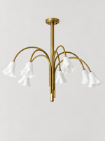 White 7-light flower glass chandelier with copper-tone arched arms, shown switched off.