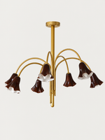 Coffee 7-light flower glass chandelier with copper-tone arched arms, shown switched off.