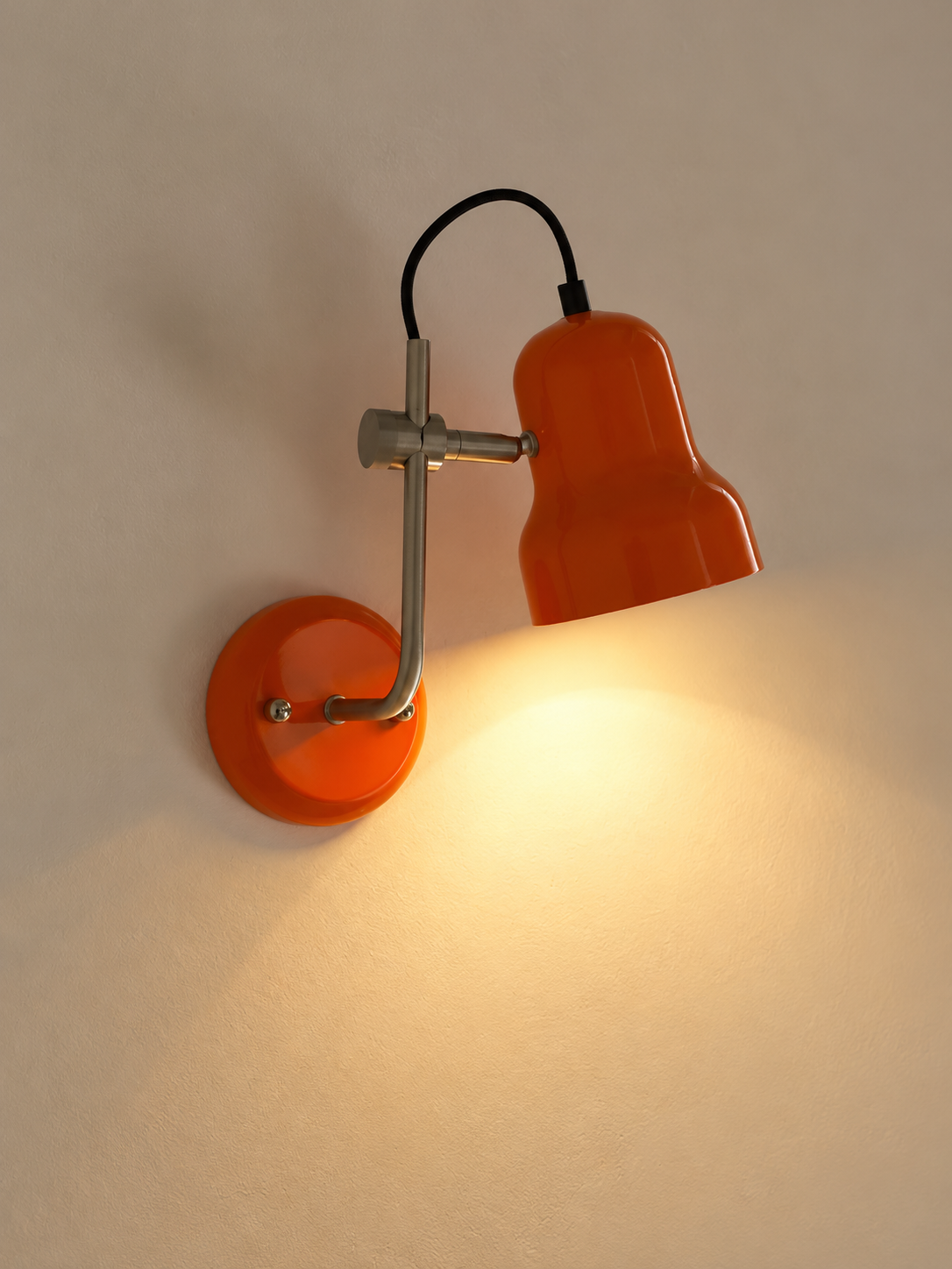 Adjustable Bell Reading Wall Light - orange angled view