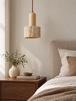 Travertine cylinder pendant with rounded wood neck — 05 A scene