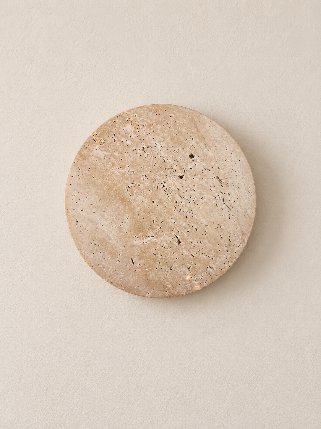 Round travertine LED wall light, standard wall-switch version