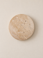 Round travertine LED wall light, standard wall-switch version