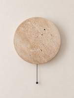 Round travertine LED wall light with black bead pull chain