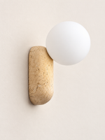 Travertine pill wall light with opal glass globe — hero off v1