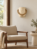 Rope-loop travertine wall sconce - room
