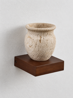 Travertine vase wall light with solid-wood support — hero off v1