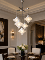 Stella Fold Chandelier in a refined home interior, portrait scene