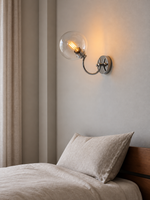 Halo Arc Sconce in a refined home interior, portrait scene