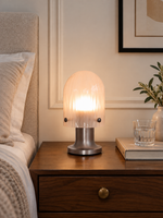 Veilstone Portable Table Lamp in a refined home interior, portrait scene