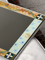Sun and moon floral border mirror — detail