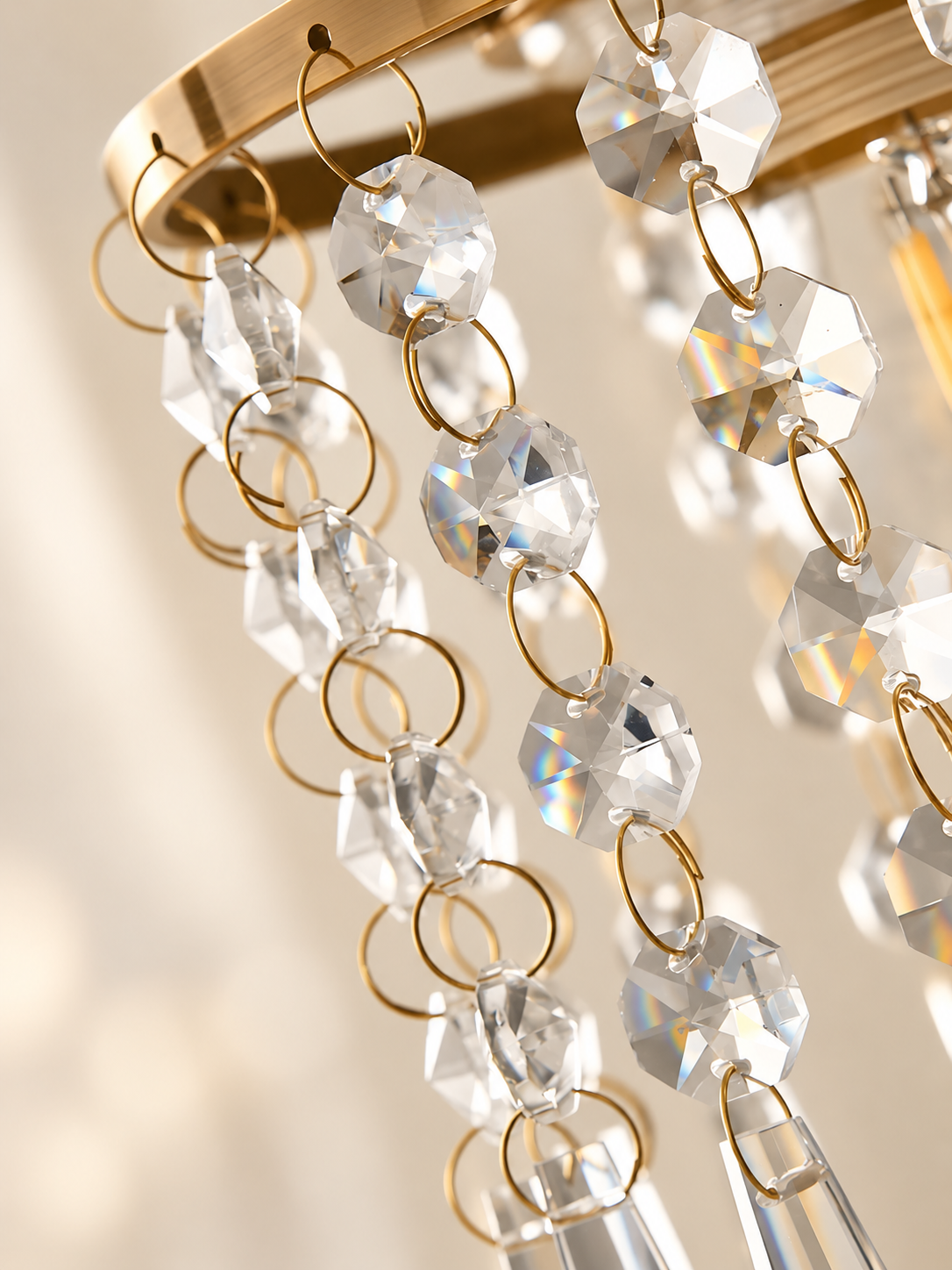 Gold-finish ring and crystal detail