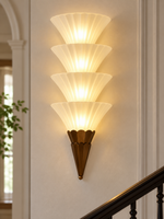 Fluted Fan Glass Wall Sconce with 4 lights in an interior setting