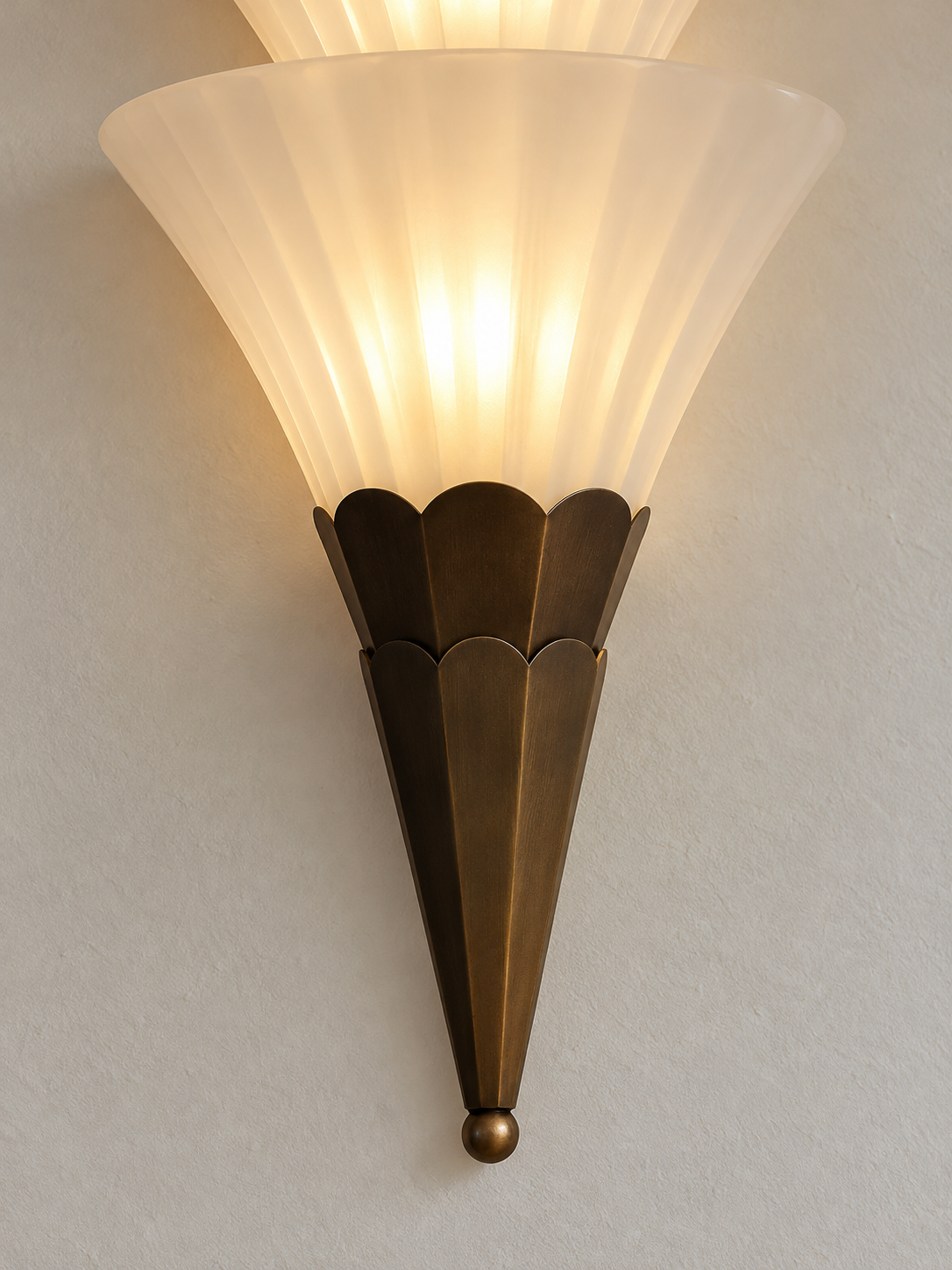 Fluted glass and coffee-brown metal detail of Fluted Fan Glass Wall Sconce