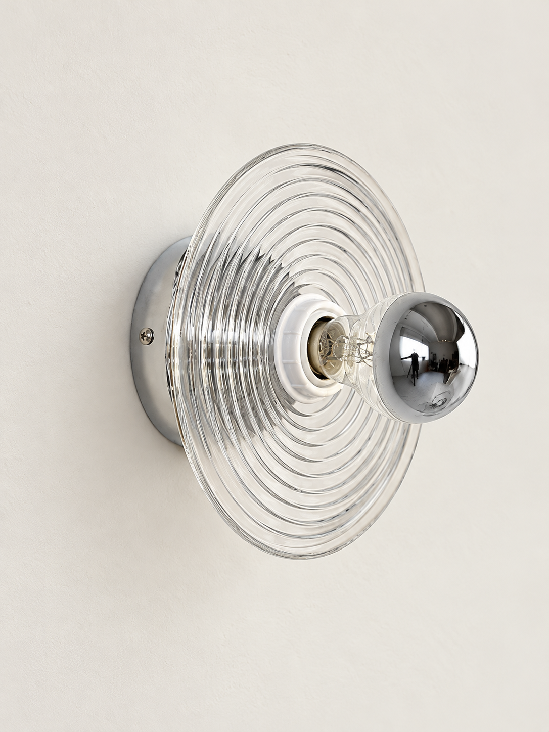 Clear concentric ripple glass hardwired wall light, unlit