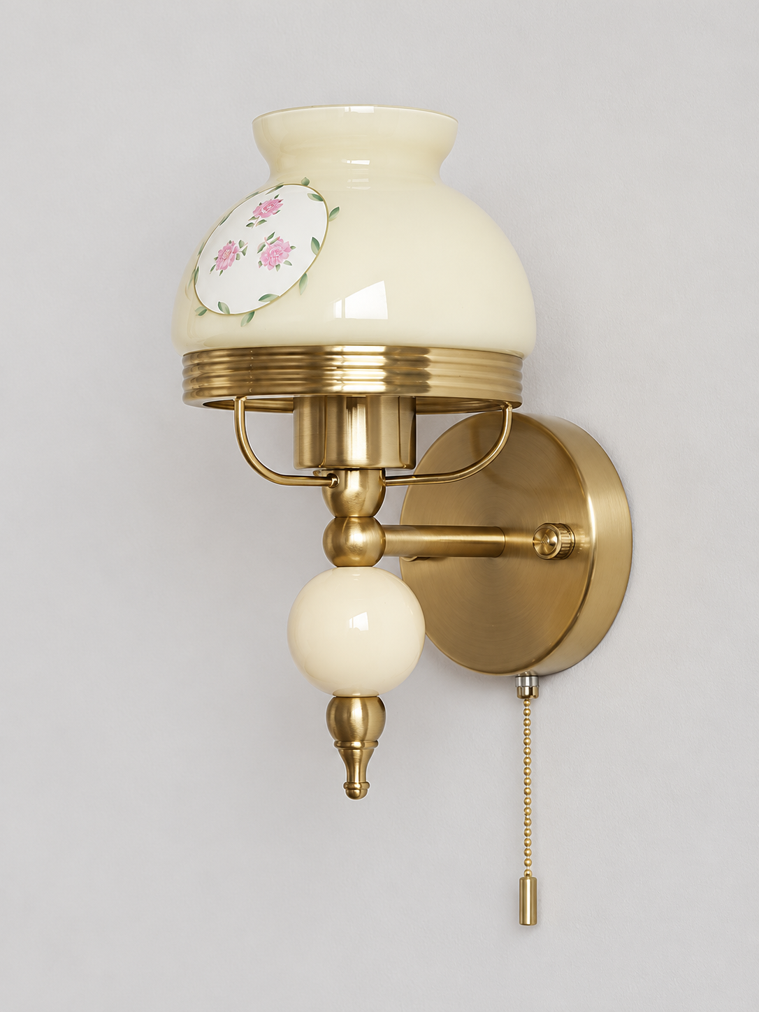 Pink or Cream Glass Wall Sconce with Decorative Sphere — Cream / Floral / Pull-chain switch — unlit product view