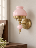 Pink or Cream Glass Wall Sconce with Decorative Sphere — Pink / Plain / Wall-switch version — unlit interior scene