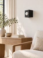 Black iron box wall light in room