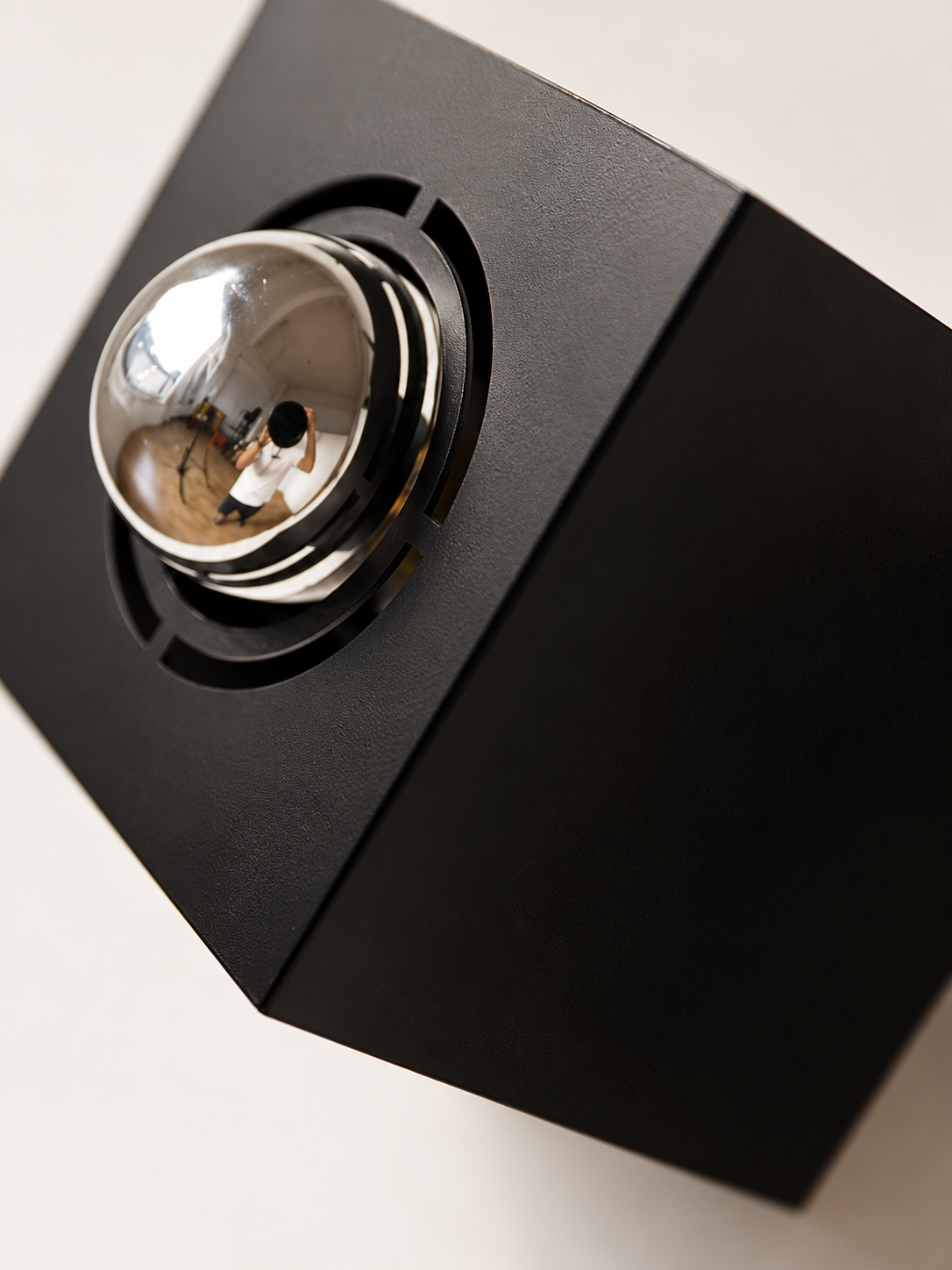 Half-mirrored bulb and iron housing detail