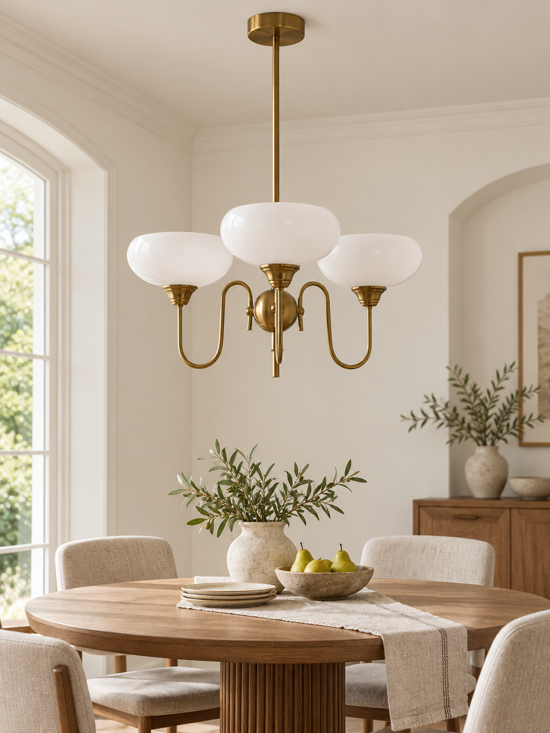 Three-light white glass bowl chandelier in dining room, unlit