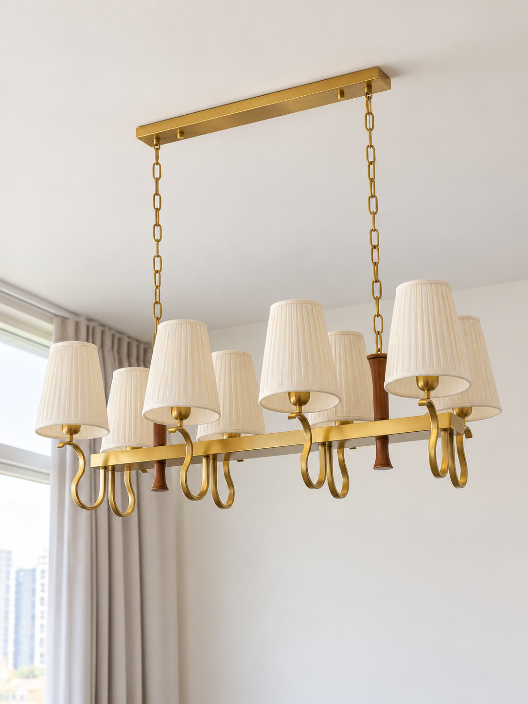 Pleated cream shade scroll chandelier, 8-light linear