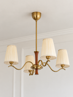 Pleated cream shade scroll chandelier, 4-light round