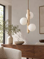 Travertine Stem and Glass Globe Pendant — Three-Light · 25 × 37 cm