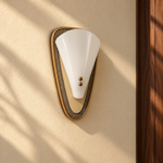 Angled view of Luma Arc wall-mounted light