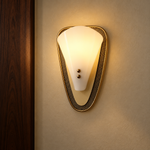 Luma Arc wall sconce shown illuminated