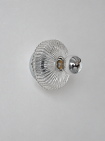 Unlit clear glass and chrome-tone socket detail