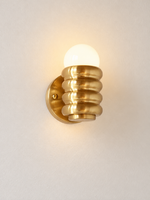 Angled copper-tone ribbed iron wall light