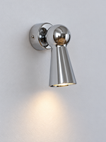 Angled close view of polished chrome wall spotlight