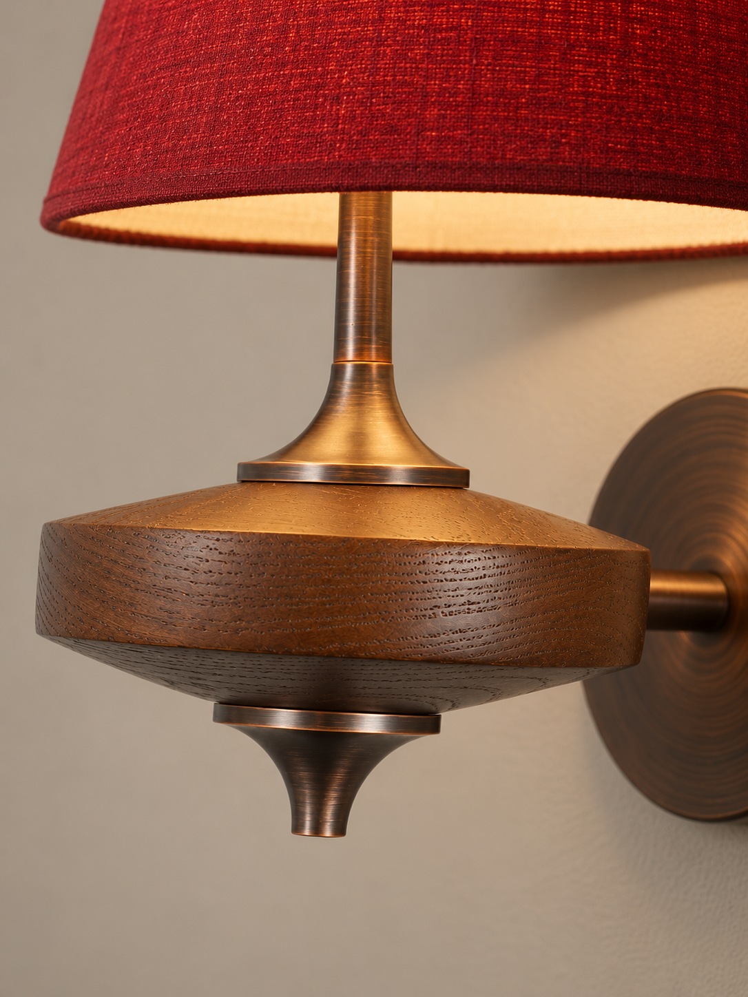 Close-up of red fabric, brown wood and metal details on MB4635 wall sconce