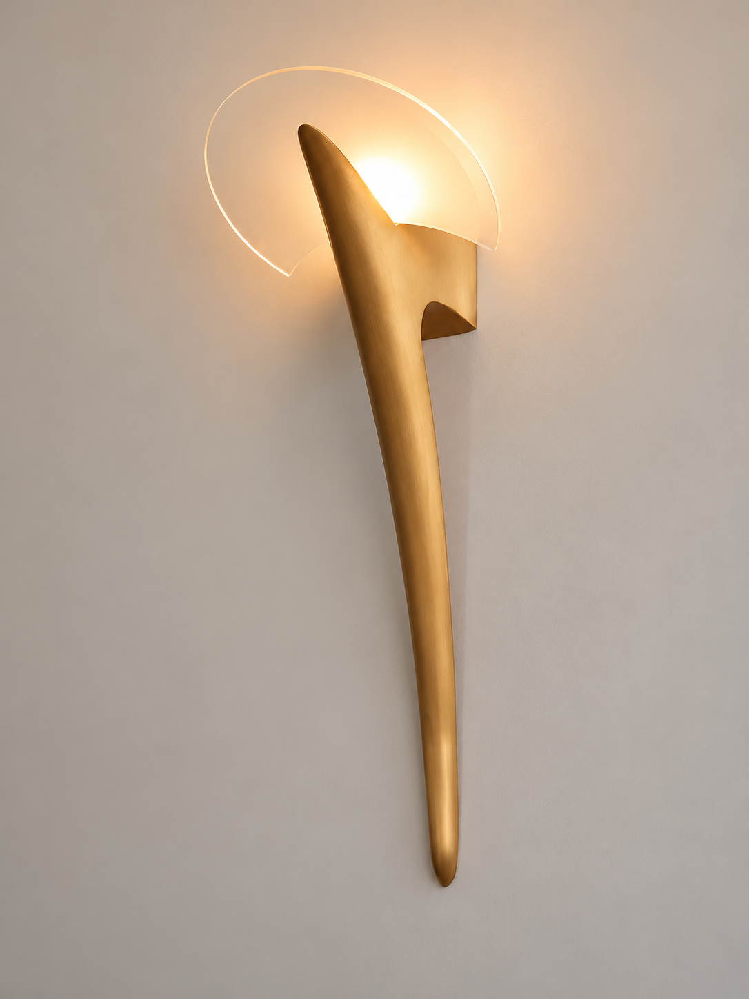 Sculptural Half Moon Wall Sconce copper-tone illuminated