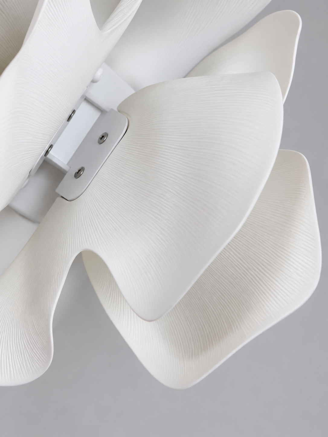 Close-up of the Ceramic Drift white ceramic petal texture and layered edges