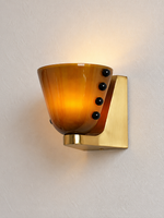 Green glass cup wall light with black bead details and copper-tone mount