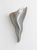 Unlit antique silver aluminum sculptural wall sconce