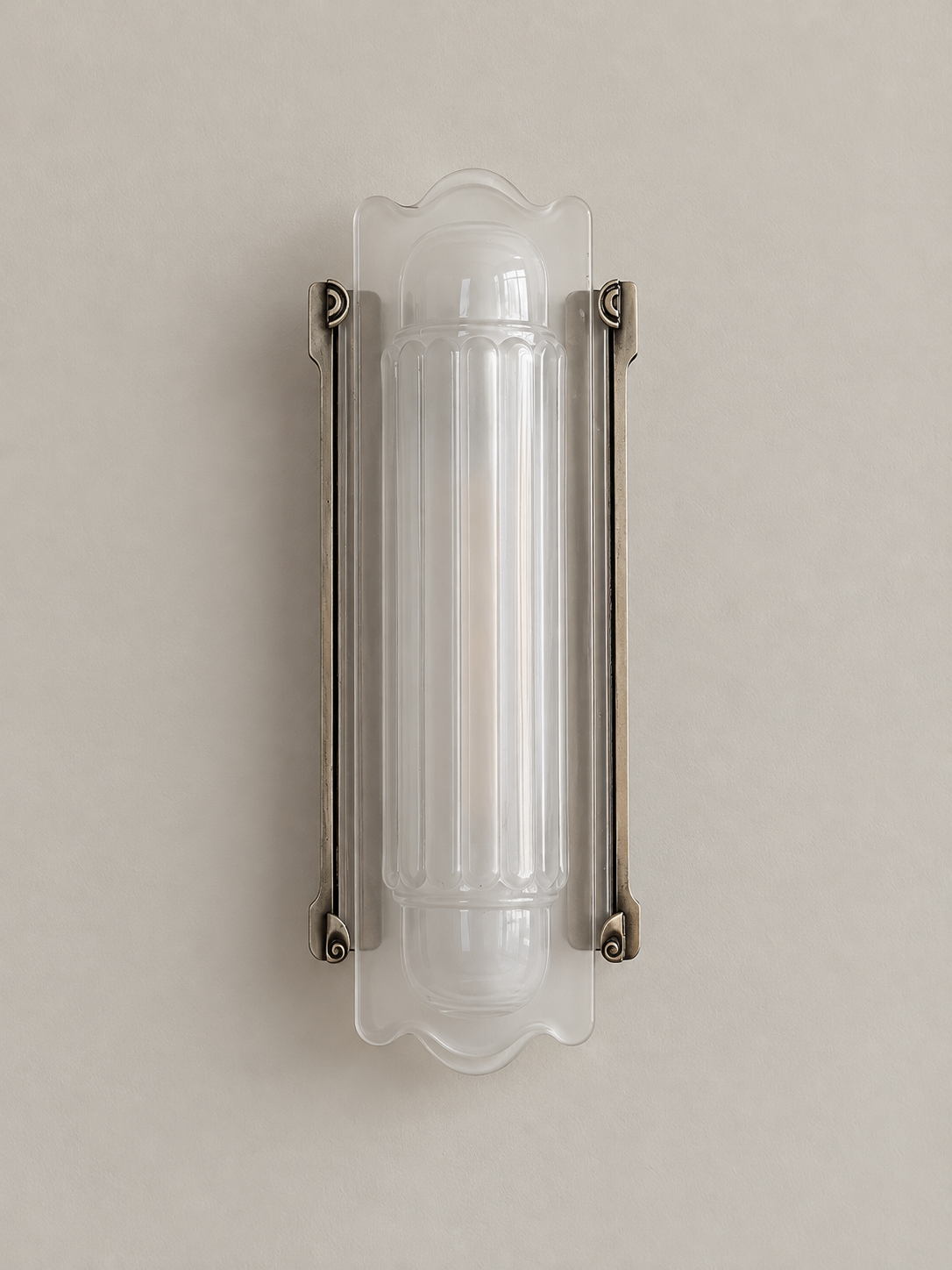 Unlit Scroll Edge wall sconce in antique silver, front view