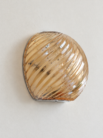 Close view of the Cognac spiral-fluted glass shade and shallow chrome mounting edge