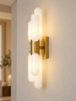 Side view of the Titanium Gold tiered glass wall sconce