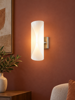 Opal Fold wall sconce front view on terracotta wall