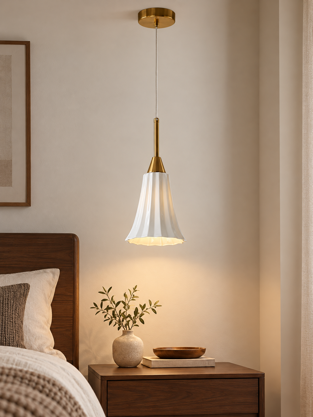 Fluted Ceramic Mini Pendant in Copper Tone and White above a walnut bedside table