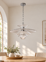 Clear ribbed glass pendant in a daylight dining nook