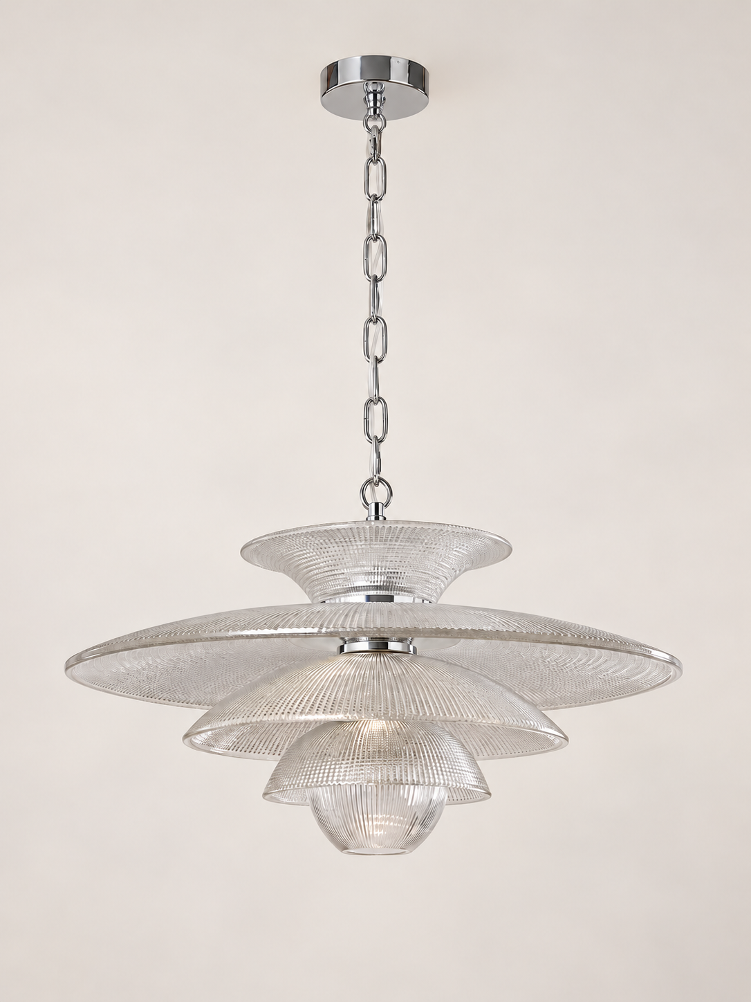 Tiered clear glass pendant on a white background