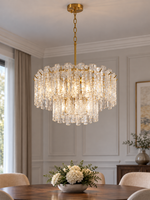 Round 60 cm tiered Ice Texture Glass Chandelier above a dining table