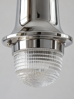 Close detail of prismatic glass dome, chrome collar and retaining screws