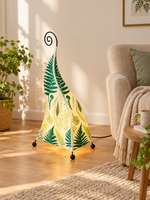 Fern Leaf patterned fabric floor lamp beside a beige reading chair