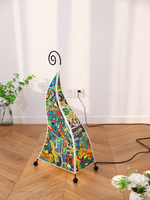 Abstract Art patterned fabric floor lamp with spiral iron top, 76 cm