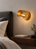 Modern Curved Arc Wall Lamp, gold bedside portrait view