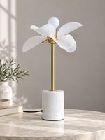 Unlit Petal Stem table lamp showing white acrylic petals and cylindrical marble base